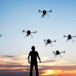 The swarm of drones traveling through the forest